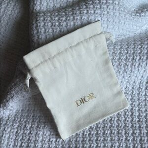 Dior Cream Drawstring Pouch with Gold Logo